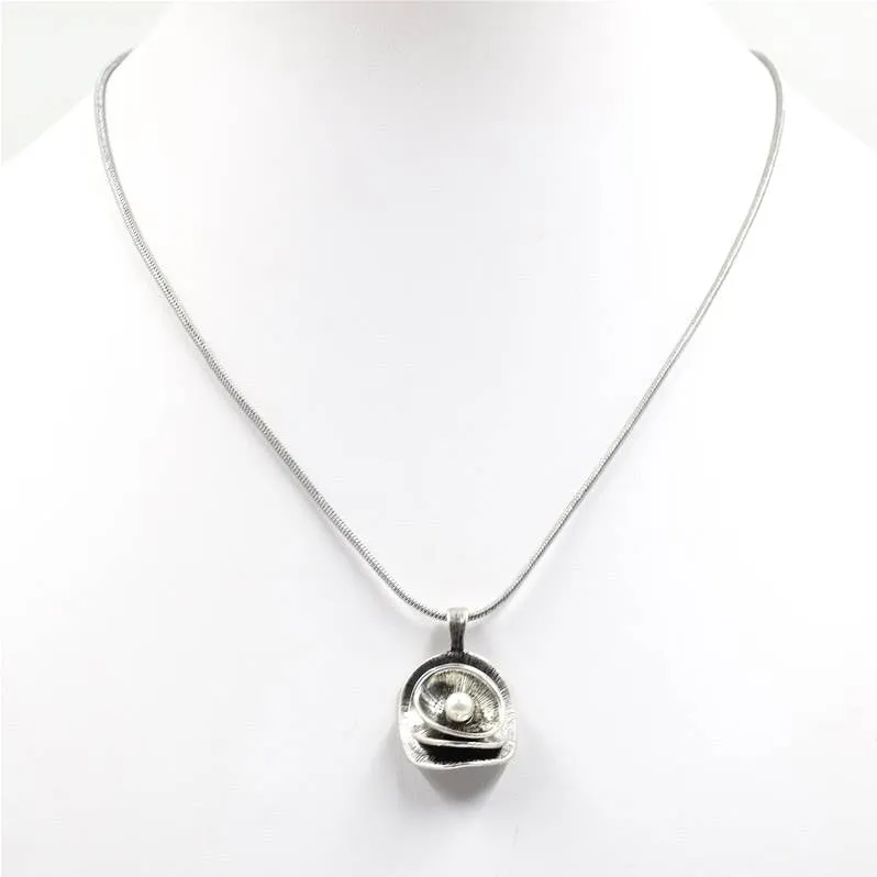 Contemporary pearl pendant on snake chain