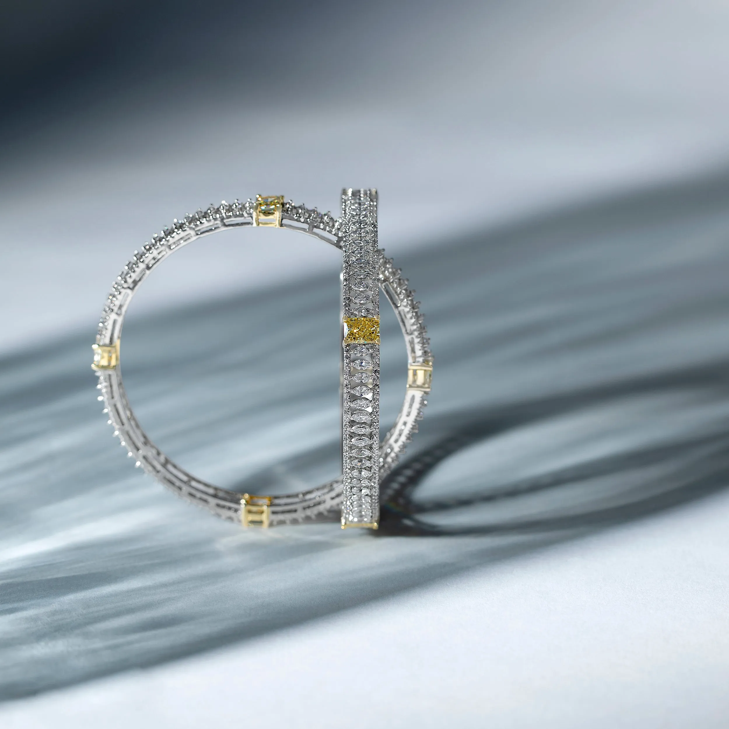 Elegant Fancy Shaped Sterling Silver Cubic Zirconia Studded Bangle Pair | SKU : 0020289775
