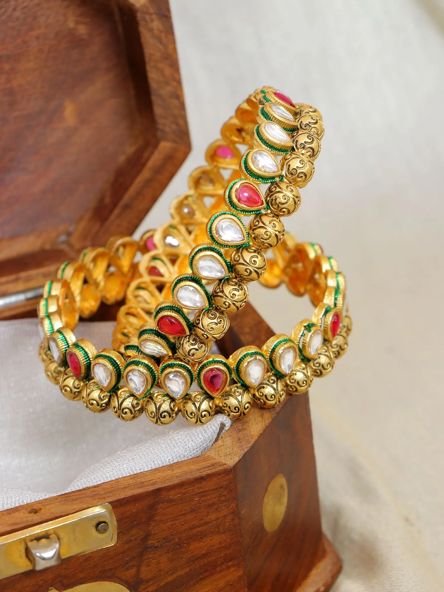 Evoke Elegance: Gold-Plated Kundan Multicolor Extravaganza Bangles Set for the Modern Traditionalist