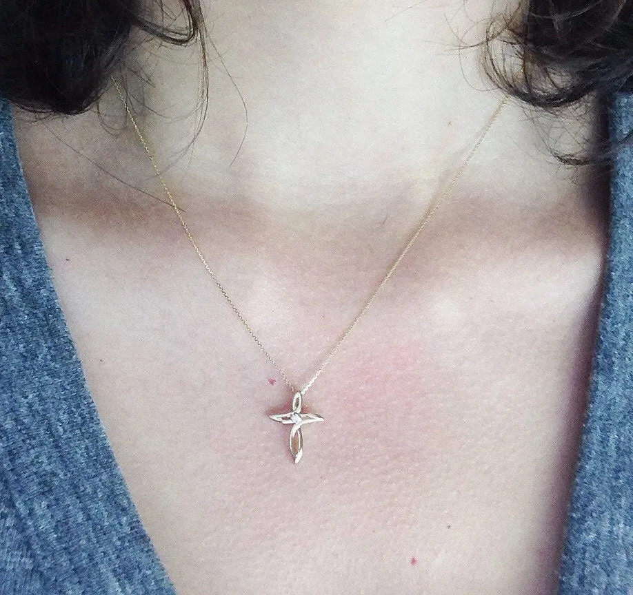 Minimalist Gold Cross with Diamond