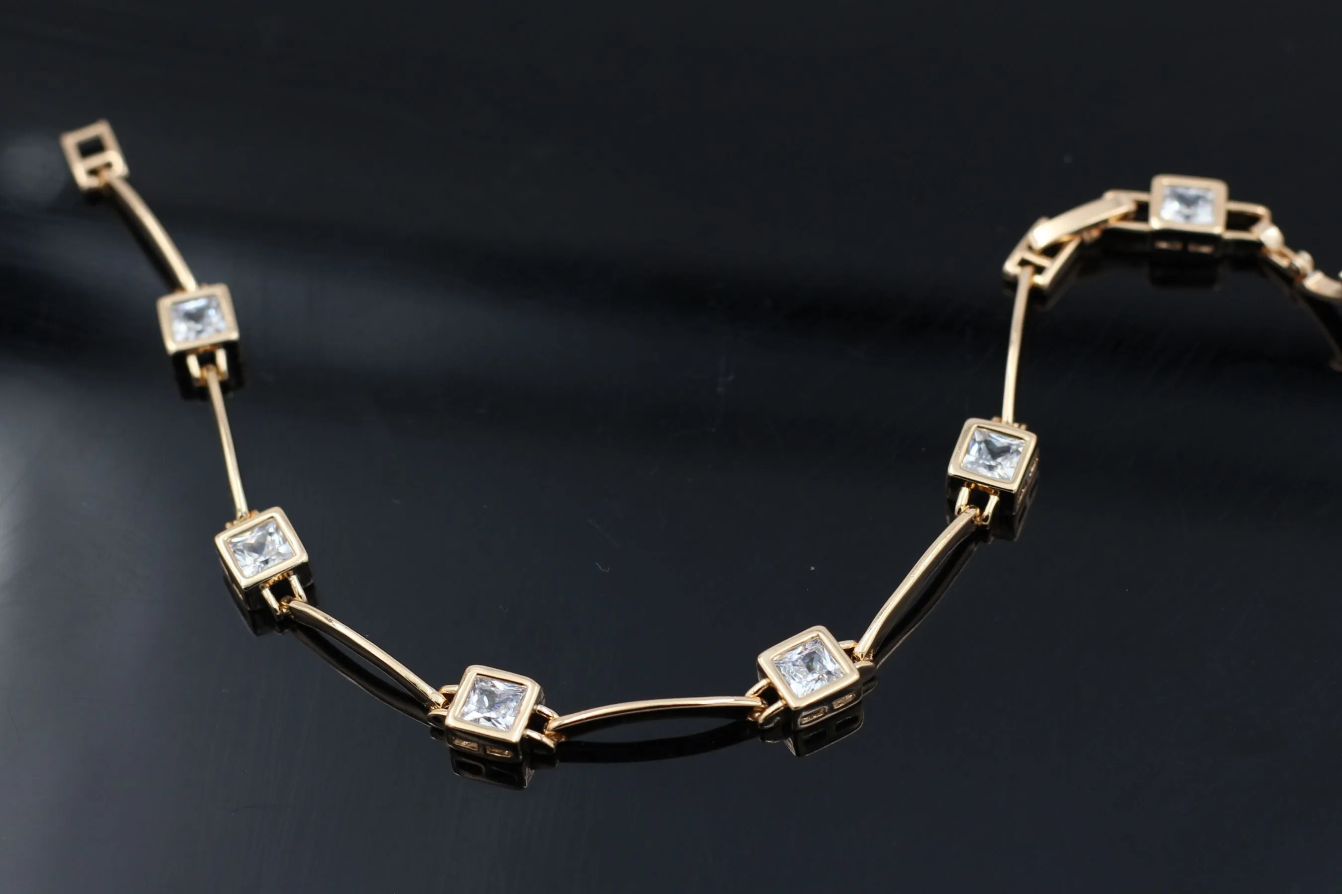 Radiant XUPING Rose Gold Bracelet with White Stones by JCSFashions