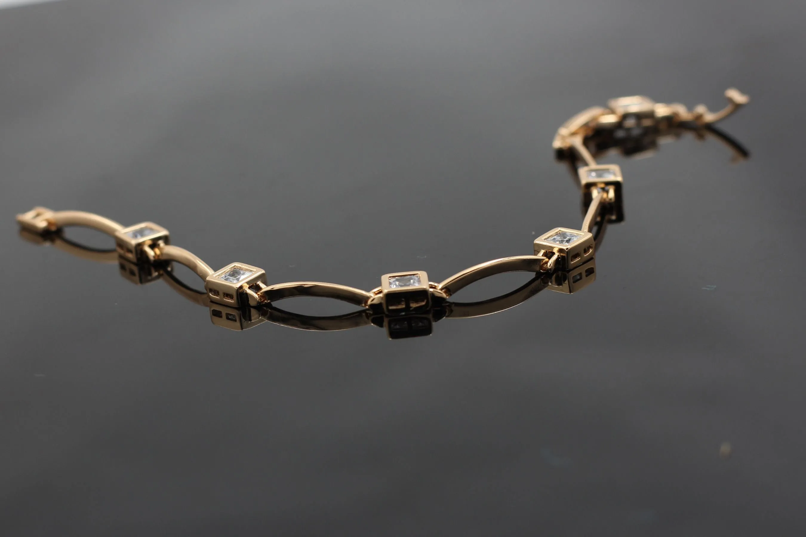 Radiant XUPING Rose Gold Bracelet with White Stones by JCSFashions