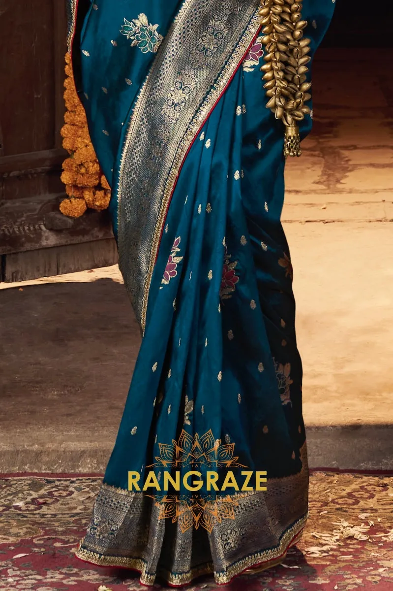 Teal Banarasi Silk Saree with Intricate Silver Zari Embroidery and Rich Designer Blouse