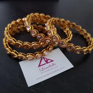Tear Drop Faux Stone Embellished Bangles with Gold Polish