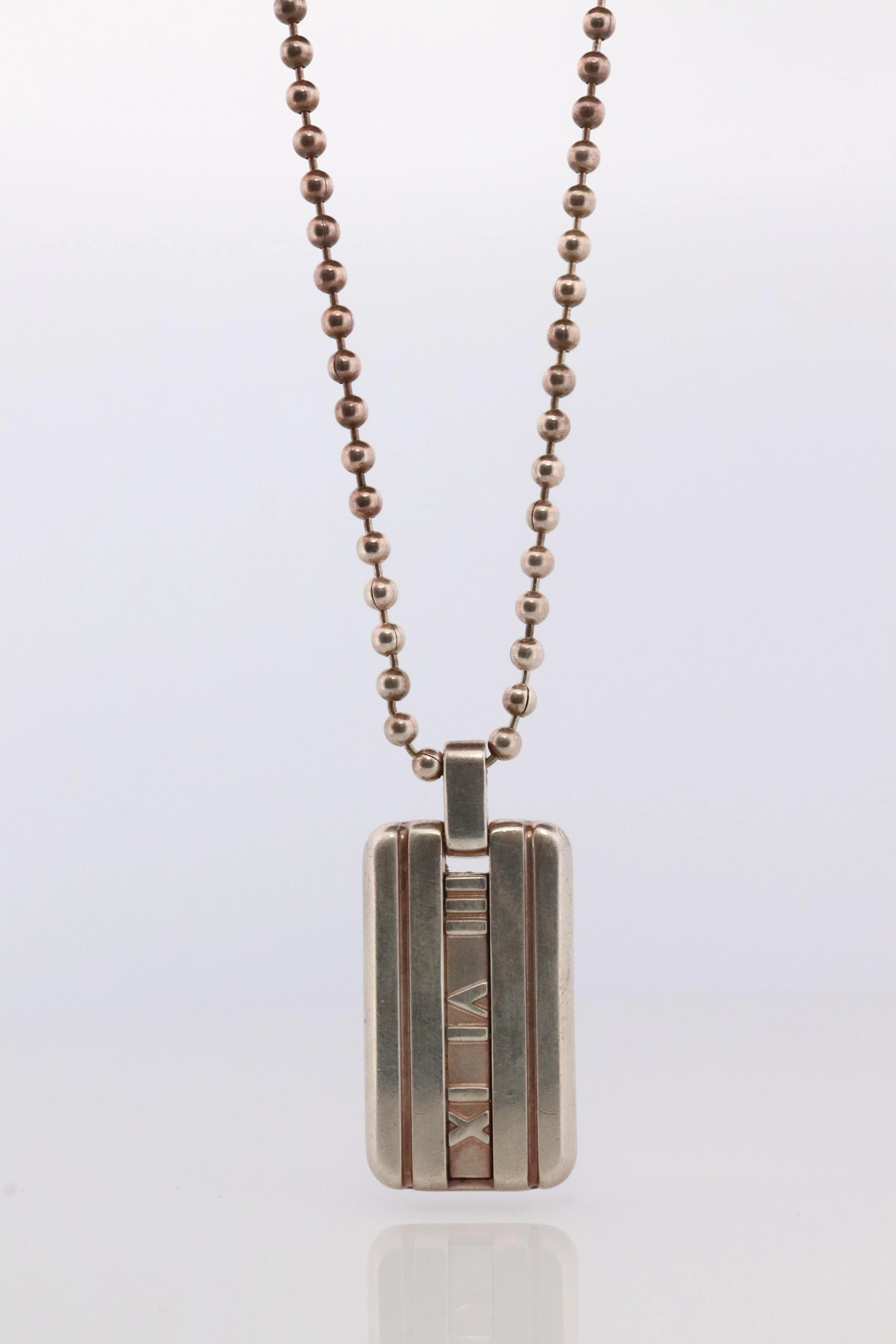 Tiffany and Co Atlas Pendant. Large Atlas Dogtag Roman Sterling Silver Necklace